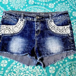 Stylish Blue Jean shorts with lace covered pockets